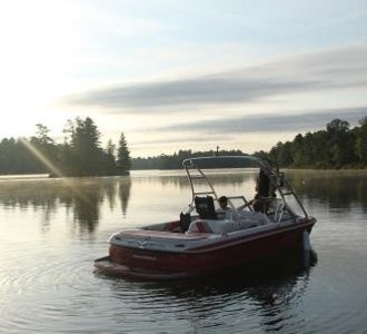 boat on the water at sunset